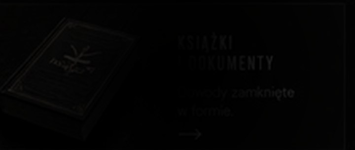 Książka i dokumenty w ciemnej oprawie